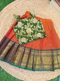 GREEN COTTON ZARI BORDERD KANCHI SKIRT AND GREEN SEMI CHANDERI BLOUSE